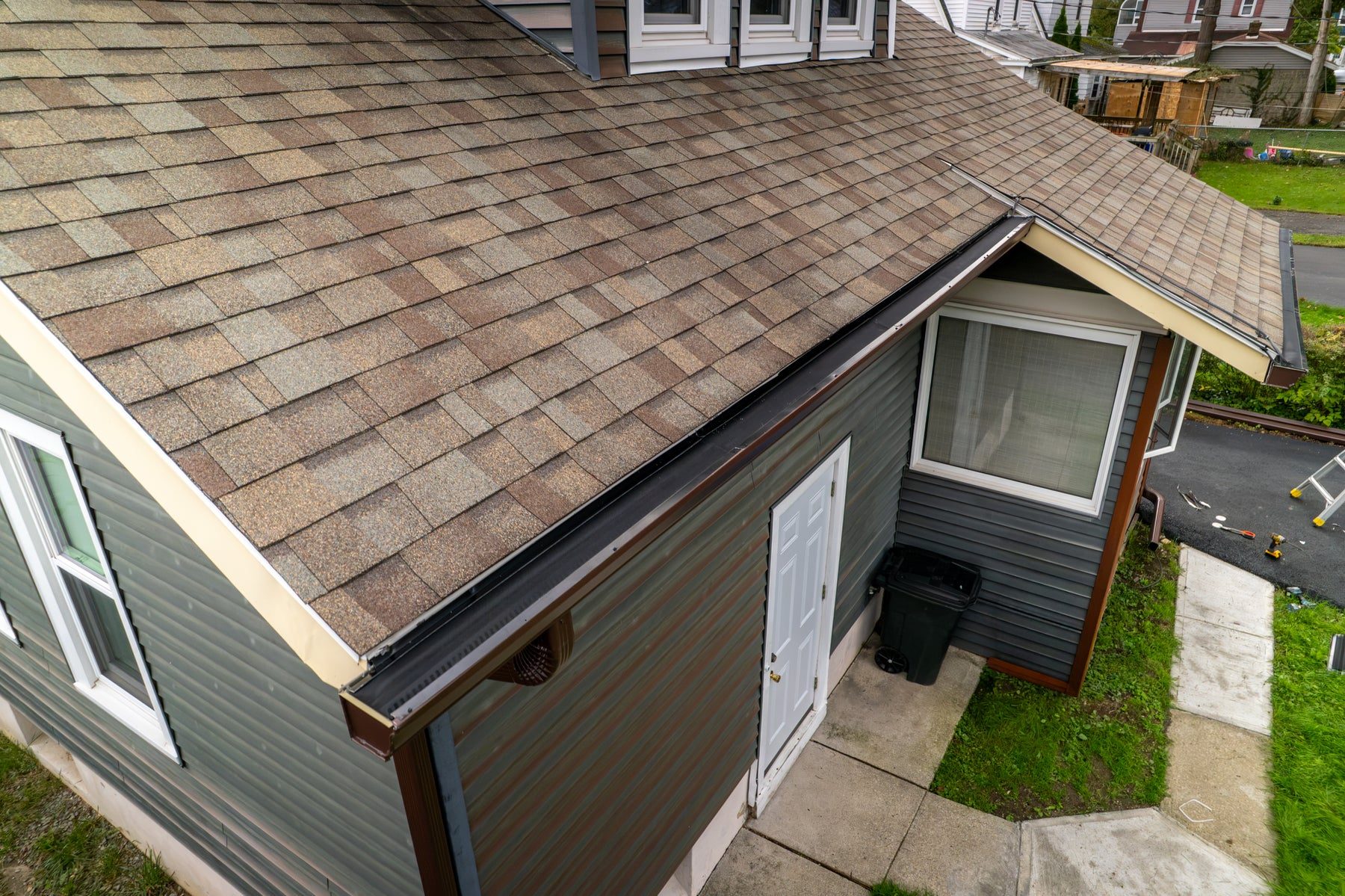 Aerial view of a finished roofline with low-profile BroGuard gutter guards