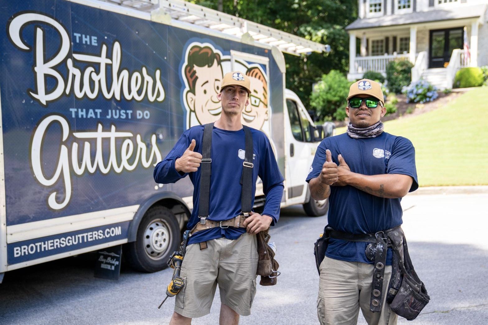 The install crew at the box truck before a job