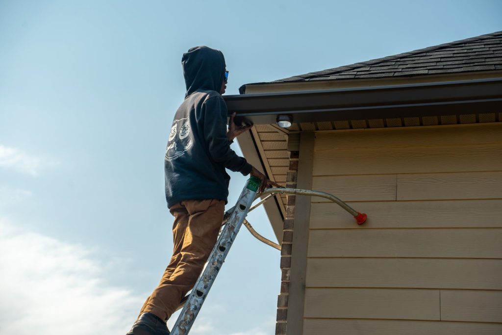 Installer working at the gable