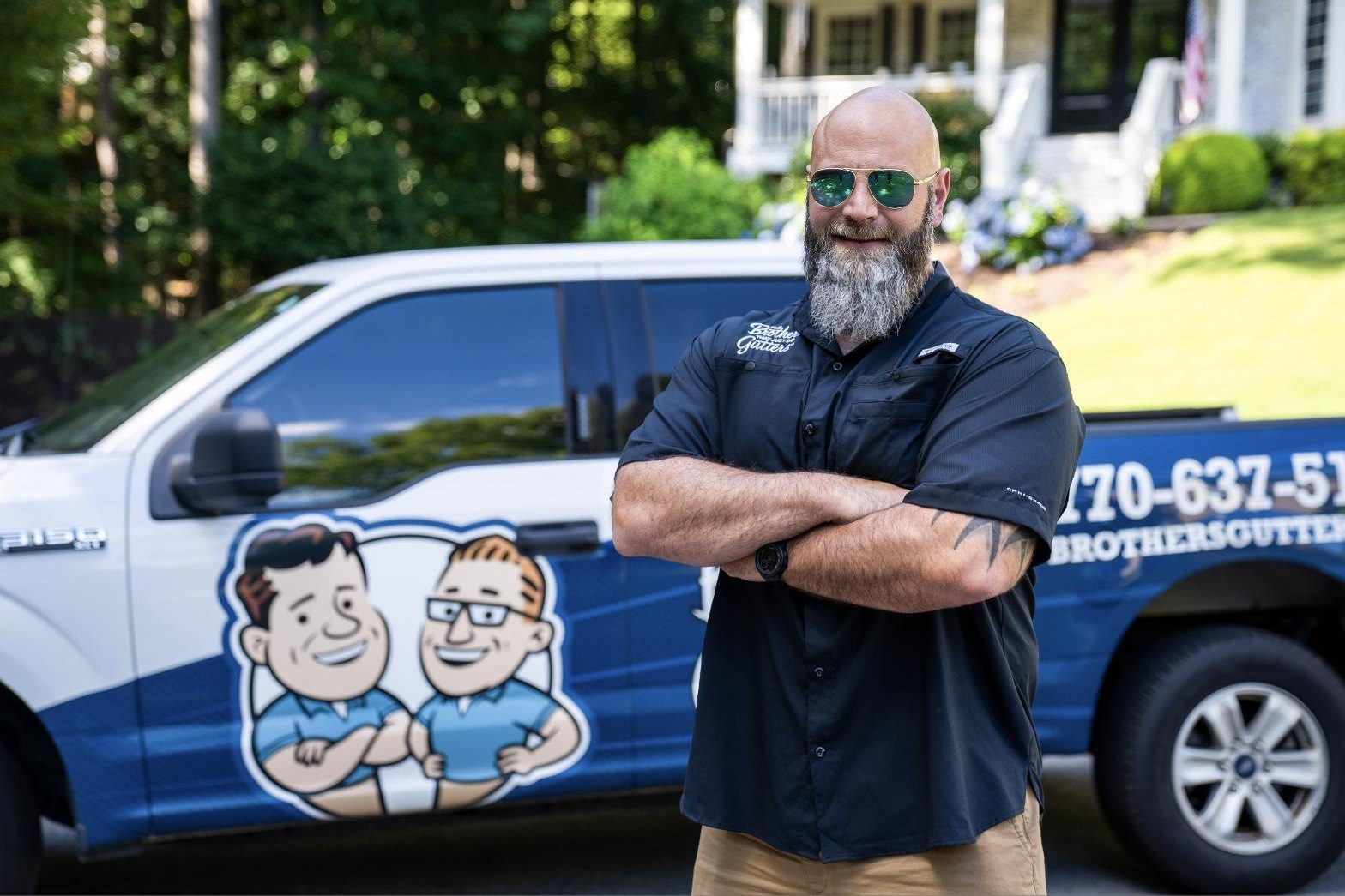 Solutionist at the company truck on a job visit