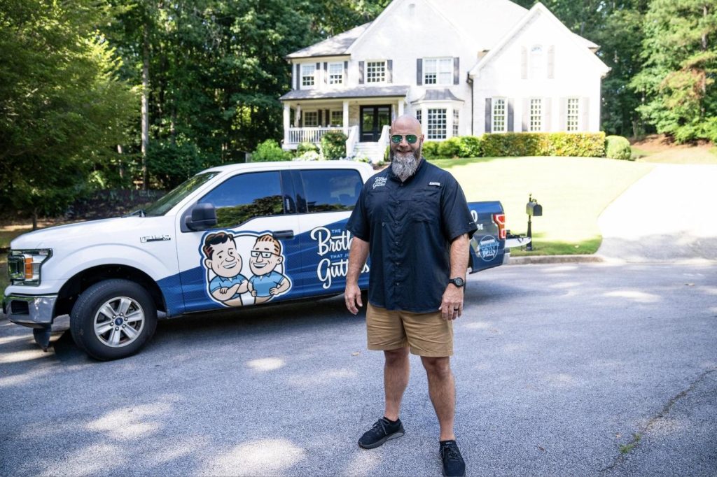Solutionist and company truck in front of a Northeast Atlanta home